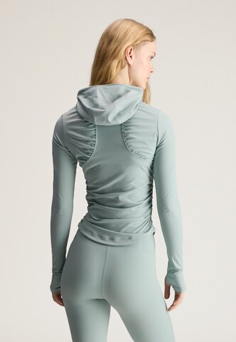 ADIDAS BY STELLA MCCARTNEY - Camiseta funcional 'Studio' en verde