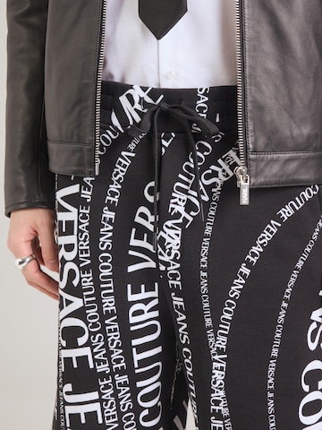Loosefit Pantaloni di Versace Jeans Couture in nero