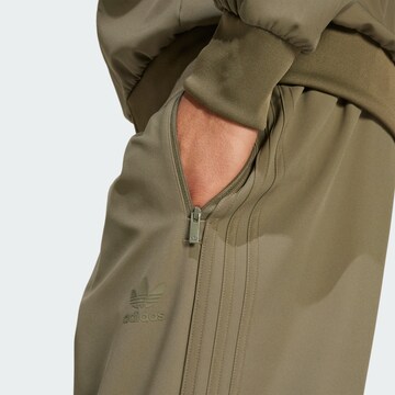 ADIDAS ORIGINALS Tapered Trousers in Green