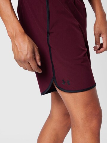 UNDER ARMOUR regular Sportsbukser i rød