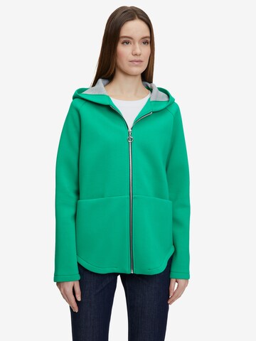 Amber & June Between-Season Jacket in Green: front