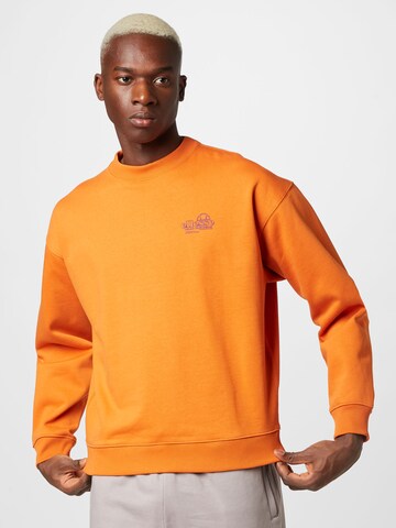 ELLESSE Sweatshirt 'Bloccare' in Oranje: voorkant