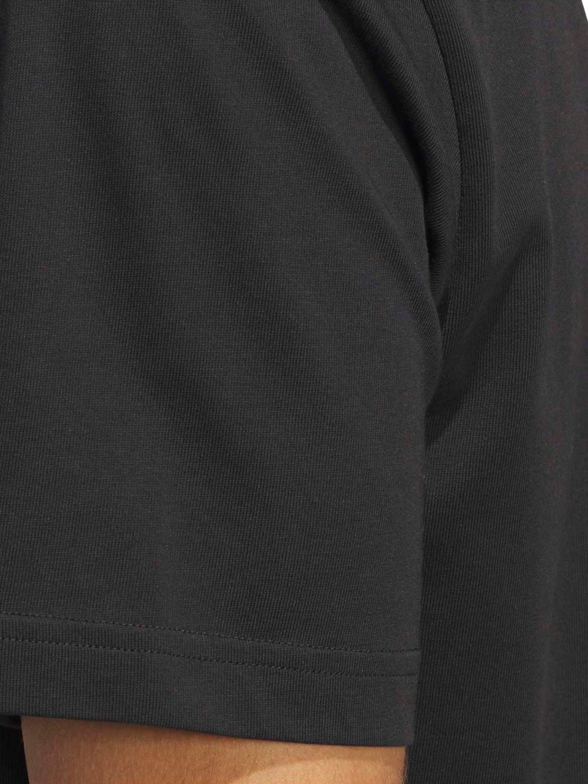 ADIDAS SPORTSWEAR - Camiseta funcional en negro