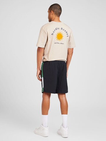 ELLESSE Loose fit Pants 'Tiaki 7' in Black