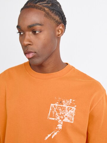 Tricou 'BRK' de la Jordan pe portocaliu
