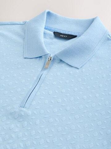 T-Shirt Next en bleu