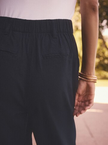 Next Loose fit Pleat-front trousers in Blue