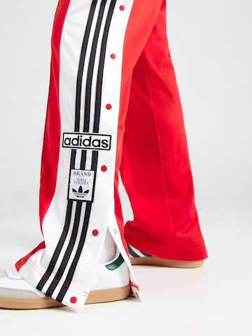 ADIDAS ORIGINALS Loose fit Trousers 'ADIBREAK' in Red