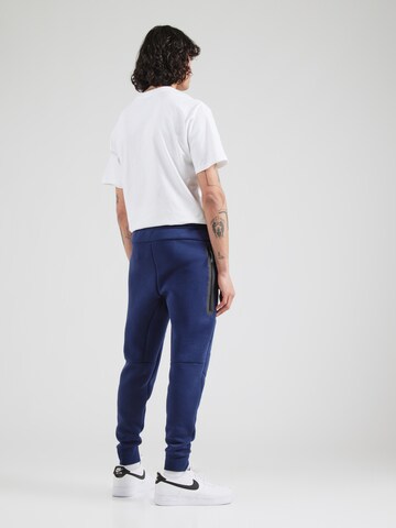 Effilé Pantalon 'TCH FLC' Nike Sportswear en bleu