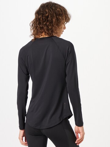 UNDER ARMOUR Performance Shirt 'Rush' in Black