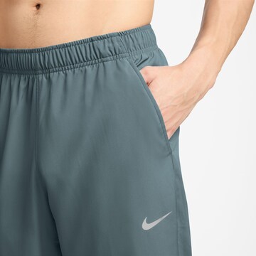 NIKE Tapered Workout Pants in Green