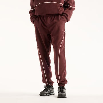 new balance - Calças 'Trackside Polar Fleece Jogger' em vermelho: frente