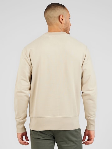 Calvin Klein JeansSweater majica - bež boja