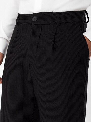 Antioch Loose fit Pleat-front trousers in Black
