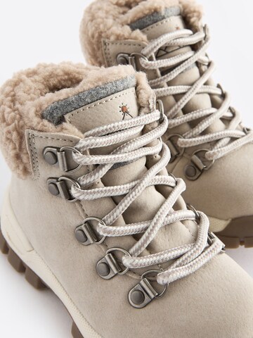 Bottes Next en beige