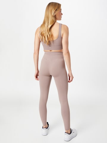 Skinny Pantaloni sportivi di aim'n in lilla