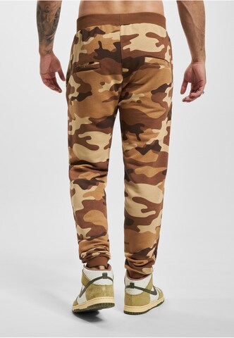 Tapered Pantaloni di Ecko Unlimited in marrone