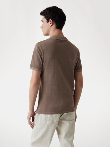 GUESS Poloshirt in Braun