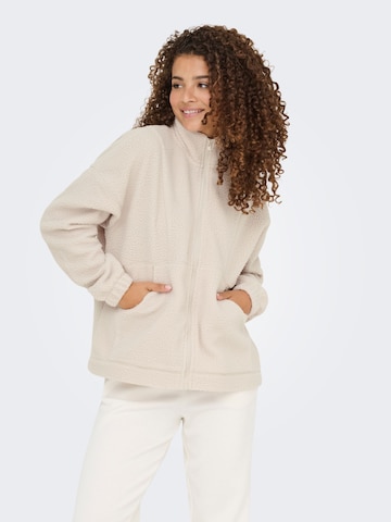 Veste en polaire fonctionnelle 'ONPMon' ONLY PLAY en beige : devant