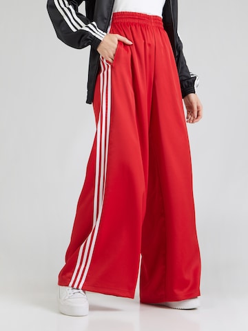ADIDAS ORIGINALS - Pierna ancha Pantalón 'Adicolor' en rojo: frente