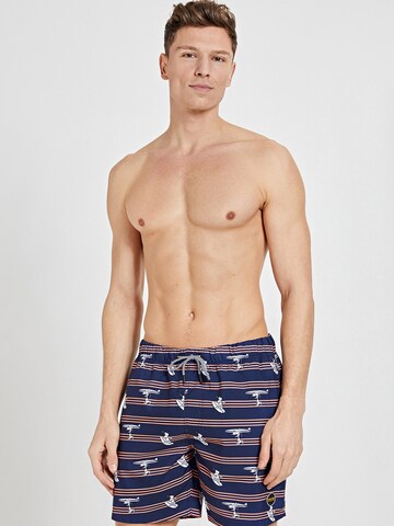 Pantaloncini da bagno 'Surfer Dude' di Shiwi in blu