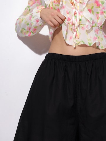 Barrel Pantaloni di Busem in nero