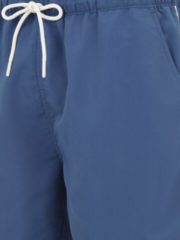 ELLESSE Board Shorts in Blue