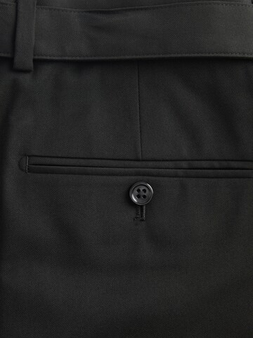 Loosefit Pantaloni con piega frontale di Next in nero