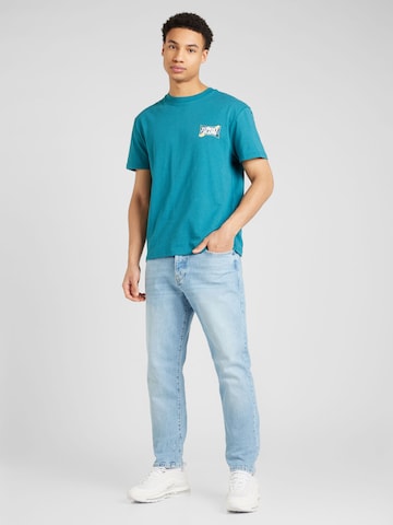Tommy Jeans T-Shirt 'FLOWER POWER' in Blau