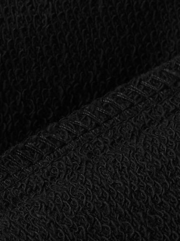 WINKIKI Sweatshirt in Black