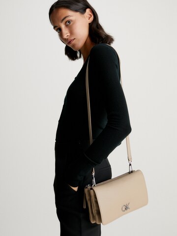 Calvin Klein Clutch in Brown: front
