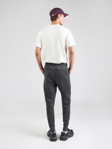 Nike Sportswear Tapered Hose 'TCH FLC' in Grau