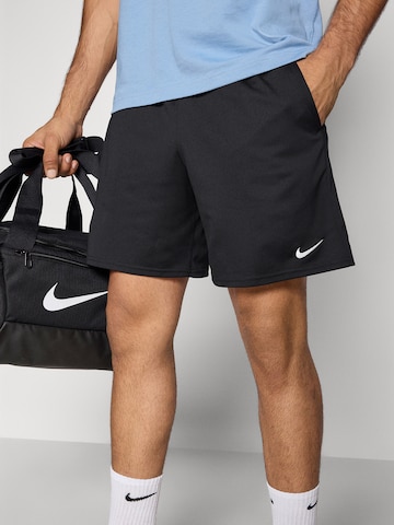 NIKEregular Sportske hlače 'FLEX' - crna boja