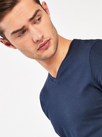 Next - Camiseta en azul
