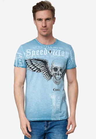 Rusty Neal T-Shirt mit 'Flying Skull' Front Print in Blau: predná strana