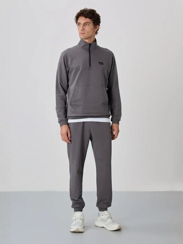 Tommy Life Tracksuit in Grey: front