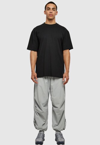 Tapered Pantaloni di Urban Classics in grigio
