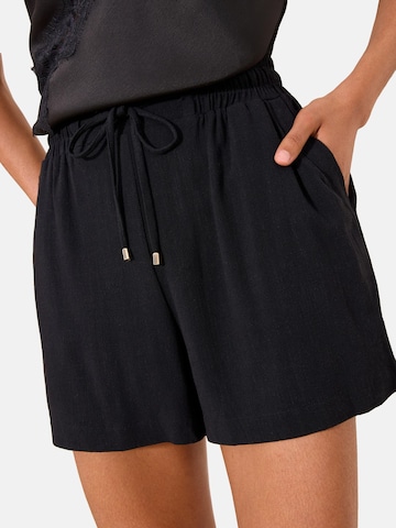 Lipsy - Pantalón en negro: frente