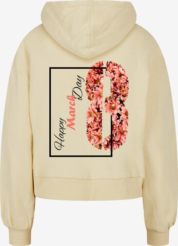 Merchcode Sweatshirt 'WD - Happy March Day' in Geel