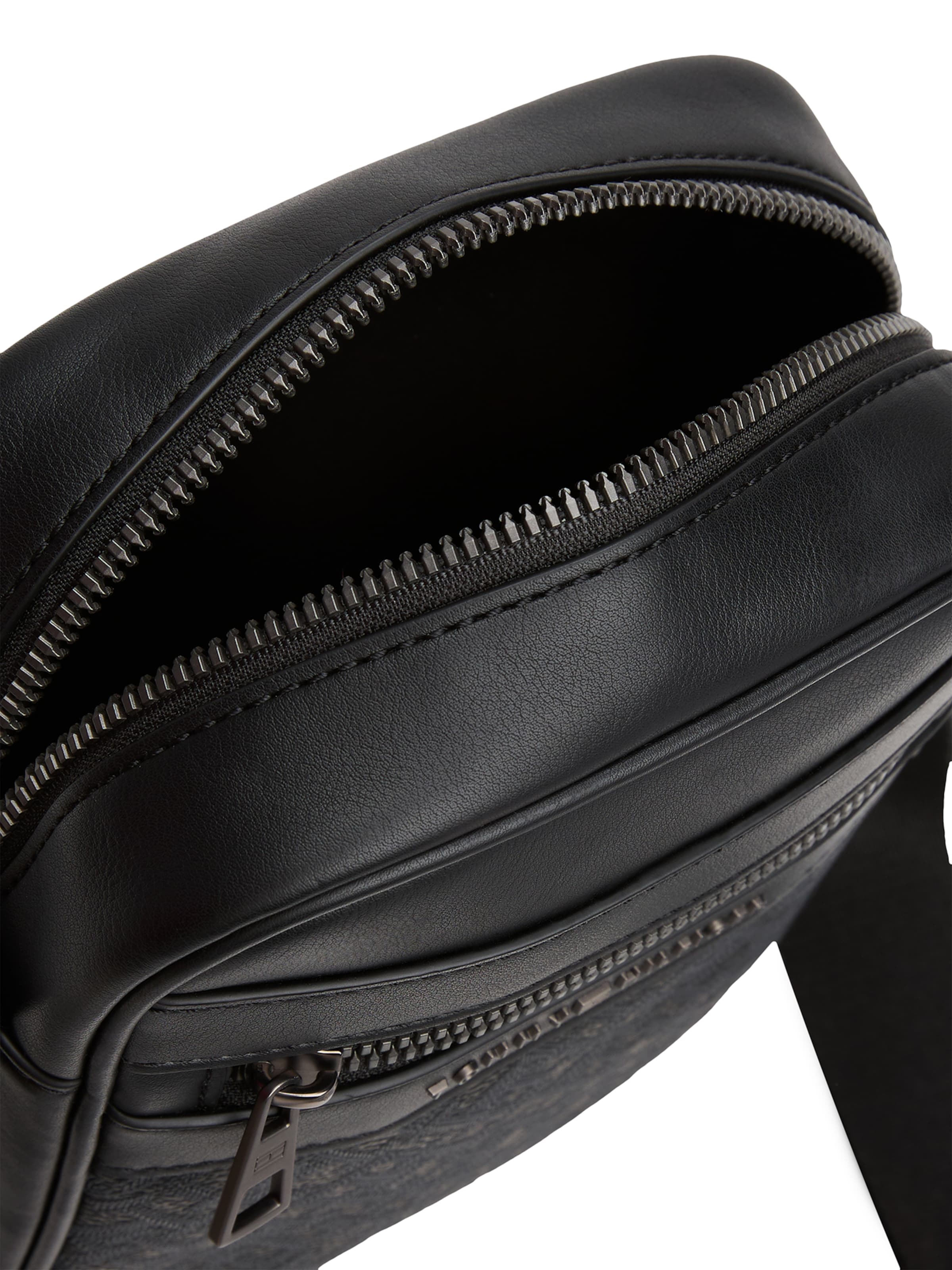 TOMMY HILFIGER Axelremsväska i svart