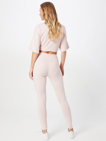 PUMA Skinny Sportbroek in Roze