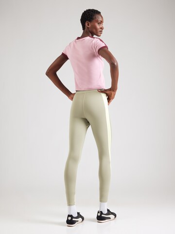 PUMA Skinny Sportbroek 'STRONG' in Groen
