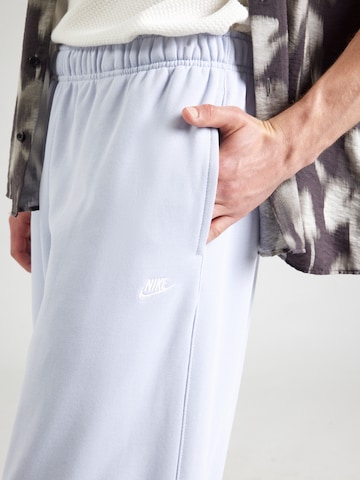 Effilé Pantalon 'CLUB' Nike Sportswear en bleu