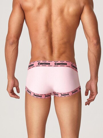 TAUWELL Boxer shorts 'Caution' in Pink