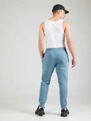 Nike Sportswear Tapered Broek in Blauw