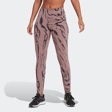 Skinny Pantaloni sport 'Future Icons Animal Print' de la ADIDAS SPORTSWEAR pe maro: față