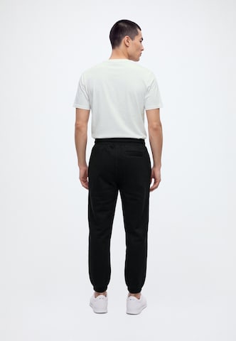 Effilé Pantalon BALMOHK en noir : derrière