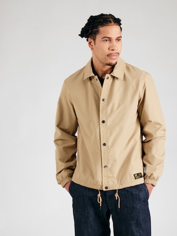 Superdry Prehodna jakna 'Surplus Otto' | rjava barva: sprednja stran