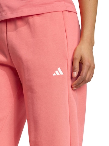 ADIDAS SPORTSWEAR - Pierna ancha Pantalón deportivo en naranja
