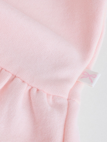 Set Next en rose